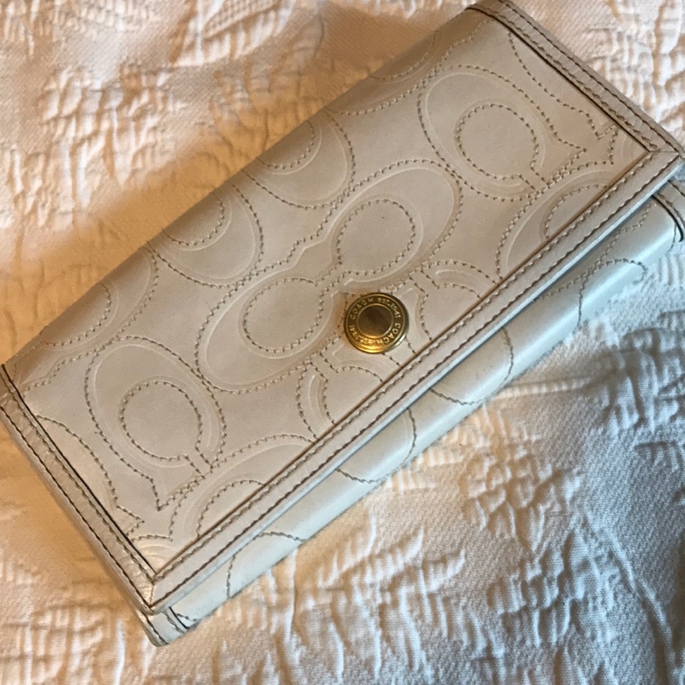 Coach wallet, cream colored embossed and stitched leather.